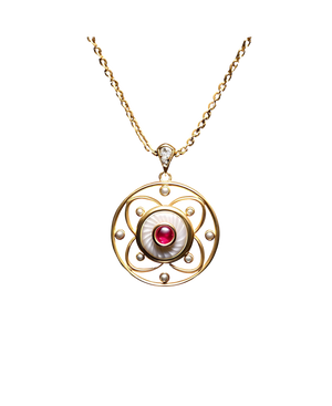 Gold-tone circular pendant with a ruby-colored center and pearl-style accents