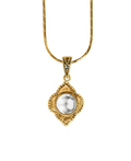 Antique-inspired gold-tone pendant with a luminous round center