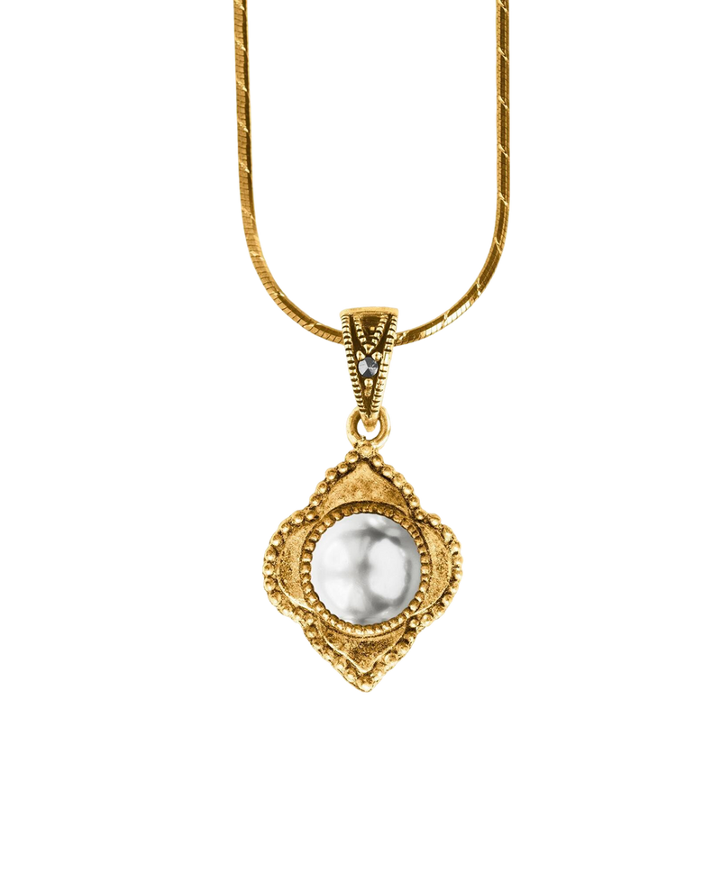 Antique-inspired gold-tone pendant with a luminous round center