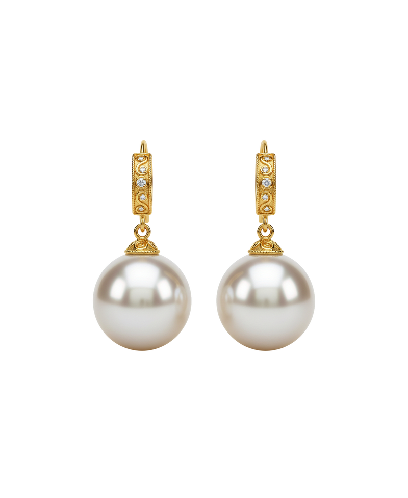 Gold-tone drop earrings with large luminous pearl-style drops