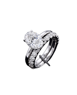Silver-tone ring set with a brilliant round solitaire and sparkling band