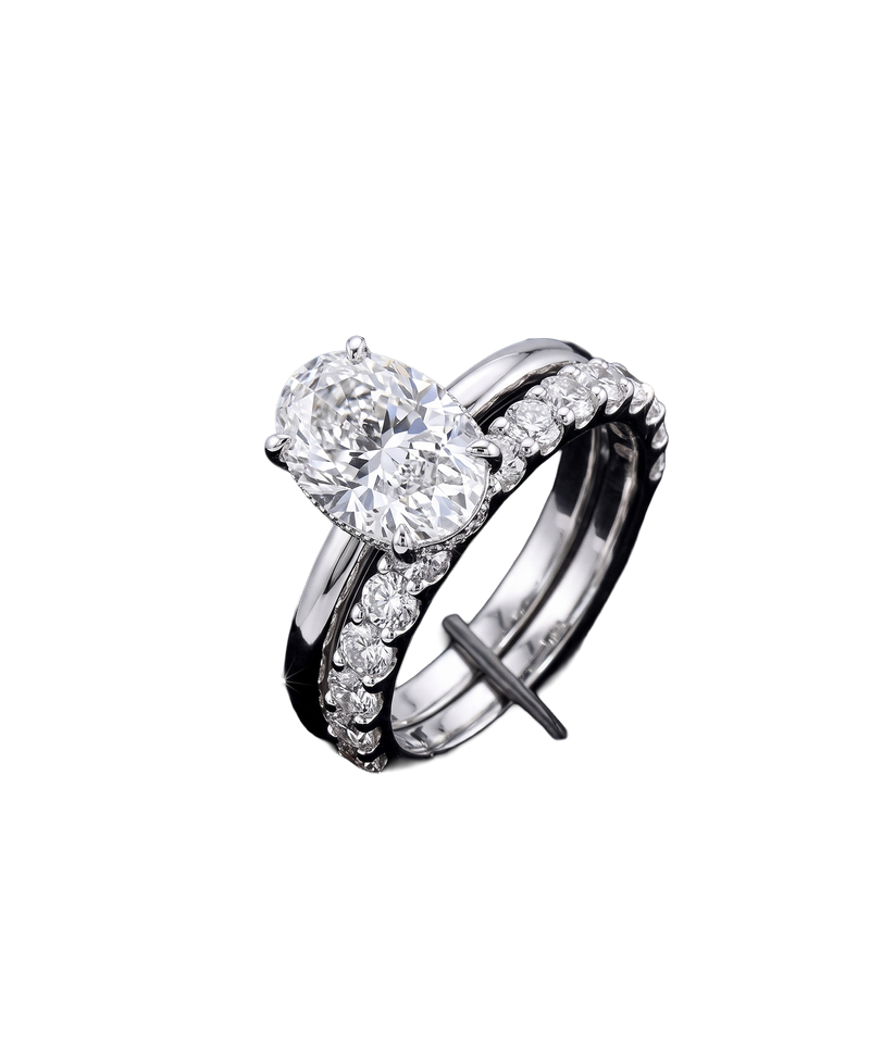 Silver-tone ring set with a brilliant round solitaire and sparkling band