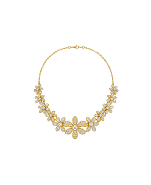 Ornate gold floral statement necklace with sparkling stones