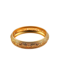 Wide gold-tone bangle with intricate engraved heritage motifs