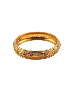 Wide gold-tone bangle with intricate engraved heritage motifs