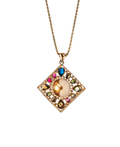 Gold-tone geometric pendant with a pearl-style center and colorful stones