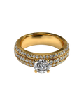 Gold-tone statement ring with a brilliant round center and sparkling stone bands