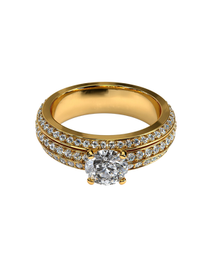 Gold-tone statement ring with a brilliant round center and sparkling stone bands